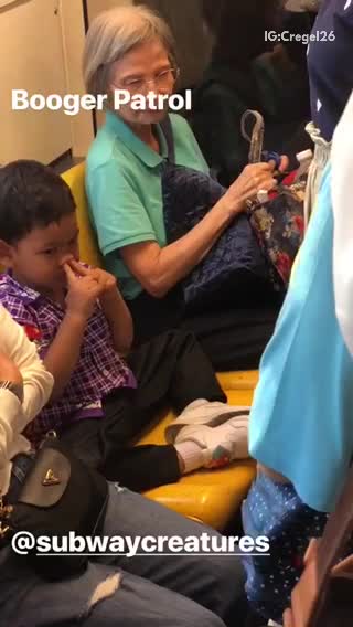 Young boy on train picking boogers booger patrol