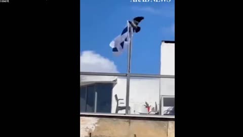 Crow takes off Israel Flag and spits it to the ground