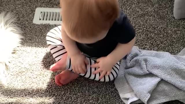 Baby Tries Catching the Sun