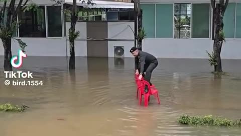 Flood Walker: Cop's Ingenious Solution to High Water