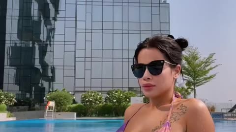 She swimming 🏊‍♀️ in pool dubai pool