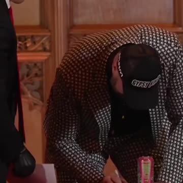 Usyk had a photo of him punching Fury in his Hitman briefcase