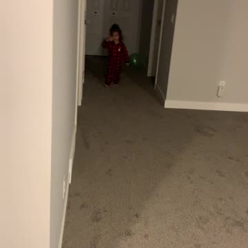 Toddler talking on phone