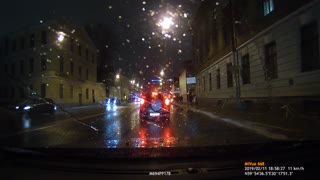 Ice From Roof Falls Onto Walking Pedestrians