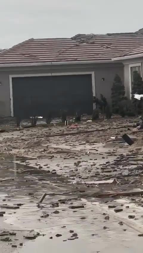 Industrial dumpster ends up on the roof of a Palm Beach Gardens home in Florida