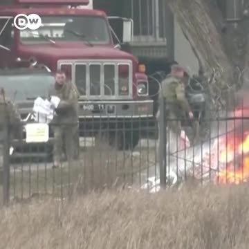 The Ukranian nazi defense forces burning papers -What Are They Burning?