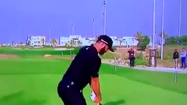 Dustin Johnson smashes 370 yard drive right into volunteer's back