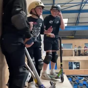 Super classic acrobatics with a scooter of a 10-year-old boy. unbelievable