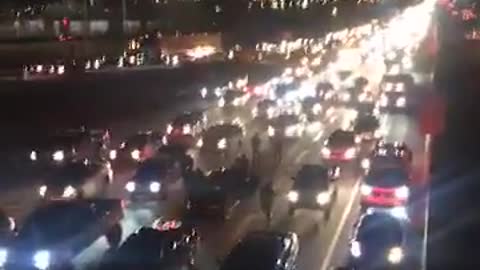 Drivers Block Highway to Do Donuts