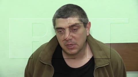 Nazi Ukrainian terrorists during interrogation tell how they killed civilians in Mariupol.