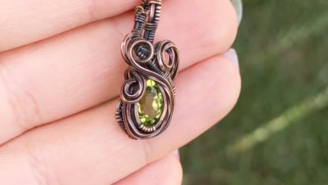 Wire wrapped peridot and copper necklace