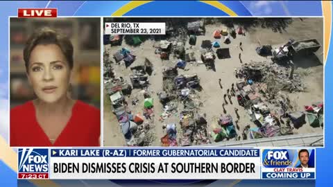 BIDEN DISMISSES CRISIS AT SOUTHERN BORDER