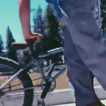 this boy is doing the moonwalk with his bike