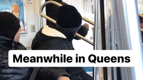 Meanwhile in queens man stands between doors 
