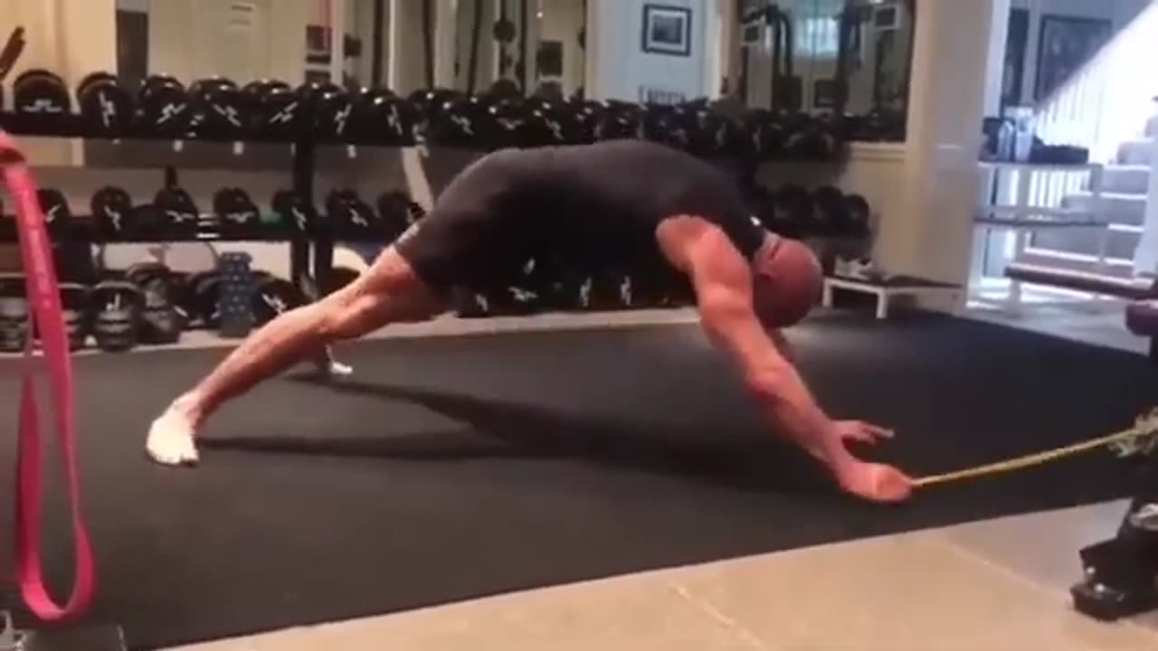 WWE superstar Triple H gym workout.