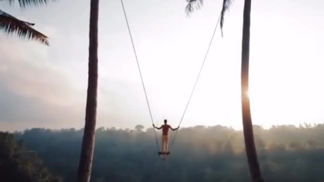 Swing next to the cliff.