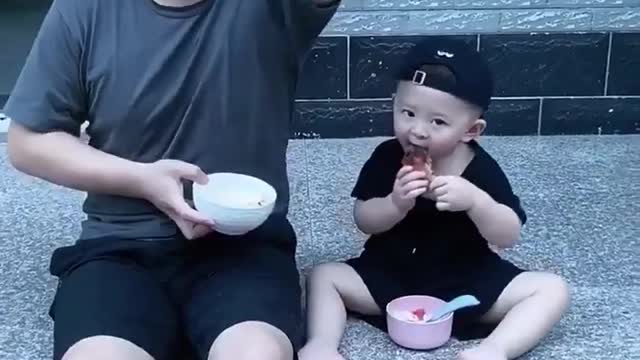Funny cute son with his funny dad