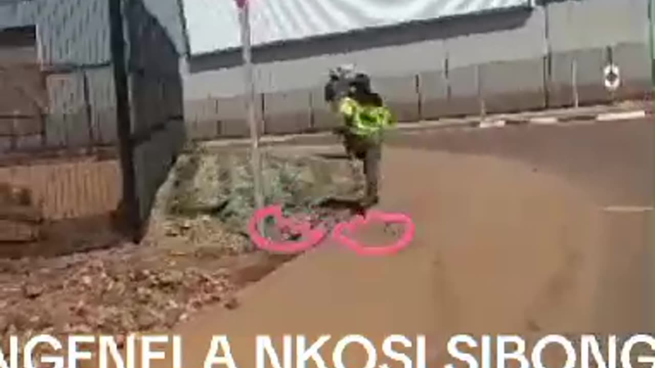 SA Police Officer chasing an elderly undocumented Zim woman