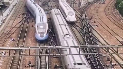 Trains passing by each other