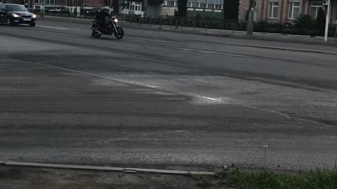 Policeman Attempts to Take Down Rider on Foot