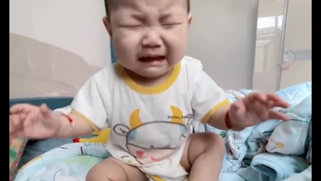 He is crying by hurting himself this baby