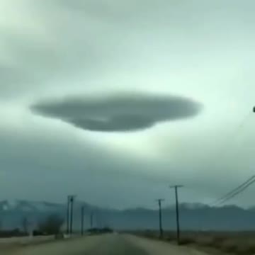 Giant spaceship among the clouds