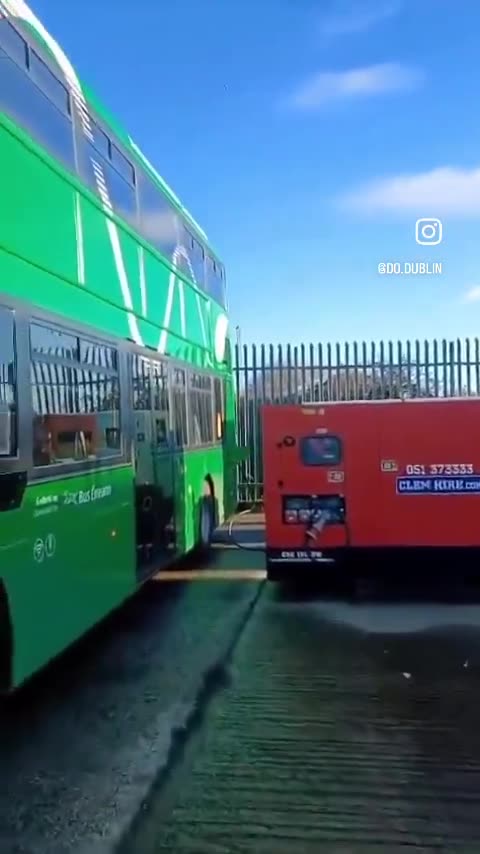 Electric busses being charged by generators. SaViNg ThE pLaNeT. 🤡