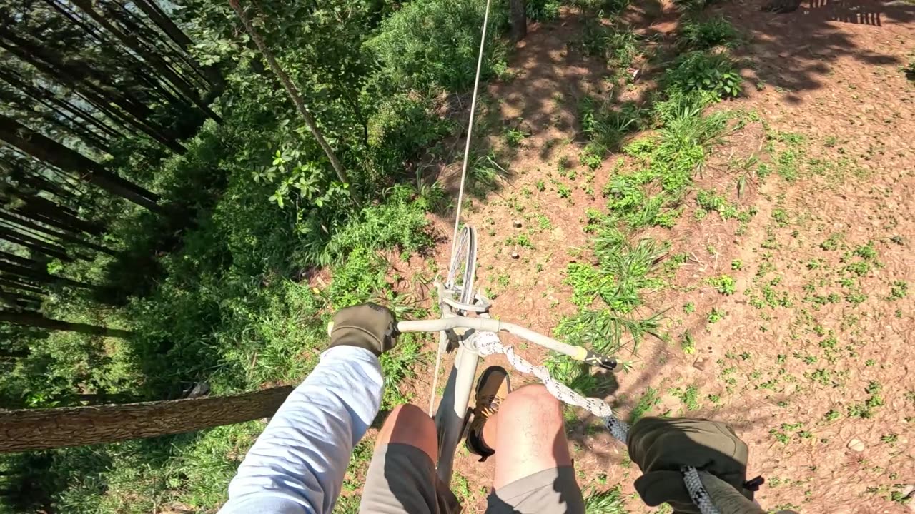 Freaky bicycle ride across a high wire in Sri Lanka