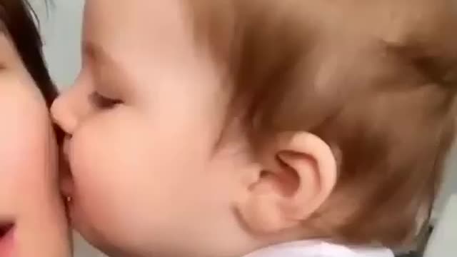 Baby kissing