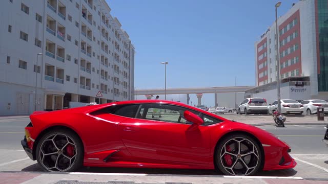 Red Sports Car Parked In An Open