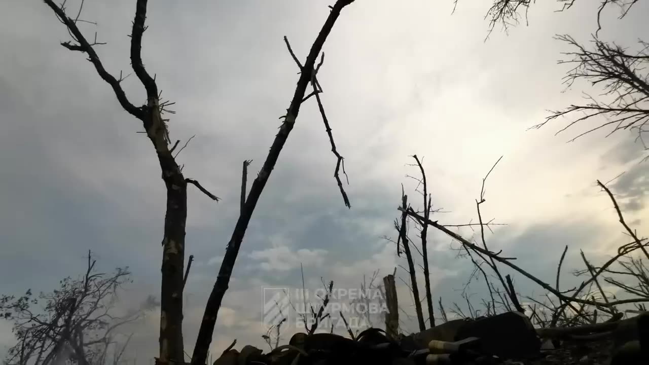 Hell After the Assault: Soldiers of the UA 3rd brigade under heavy enemy fire.