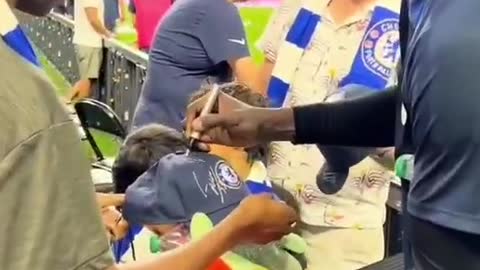 Very kind football superstar signing autographs for fans