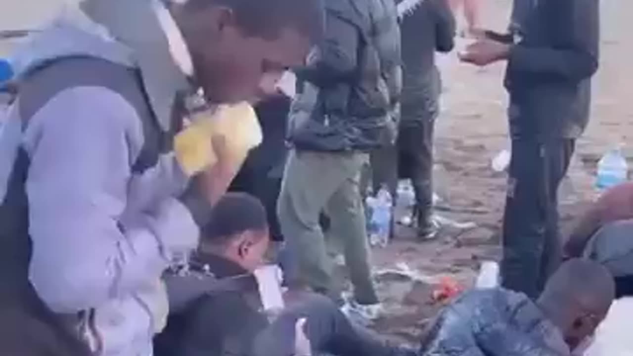 “Refugees” are handed new phones upon their arrival in Europe.