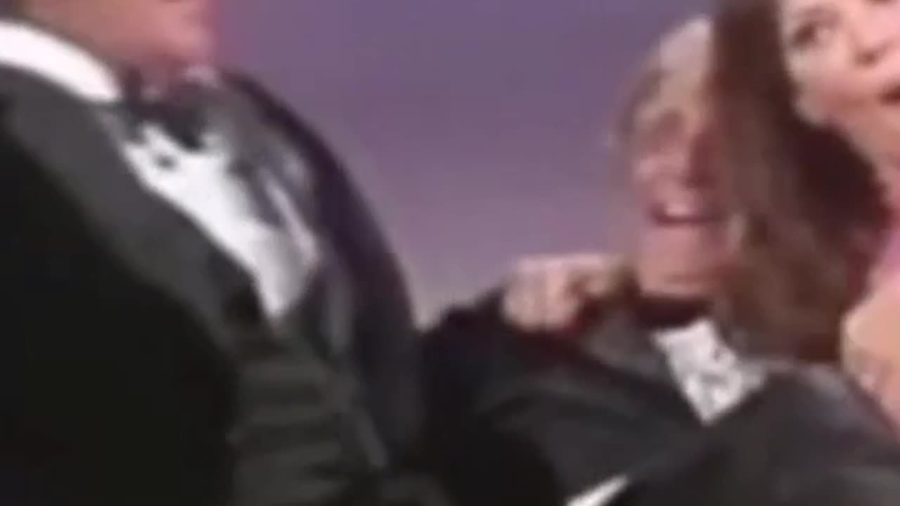 Dean Martin Rips A Hole In The Seat Of His Pants After A Dance Routine.