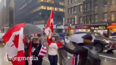 USA Patriots on the streets outside The Canadian Consulate in Manhattan New York