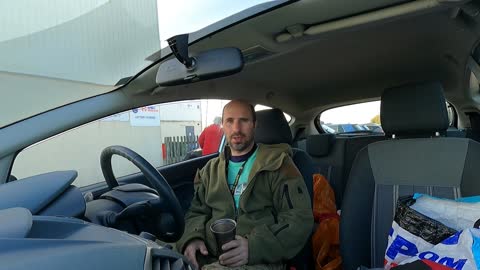 Coffee time in a car before hike . By beach.
