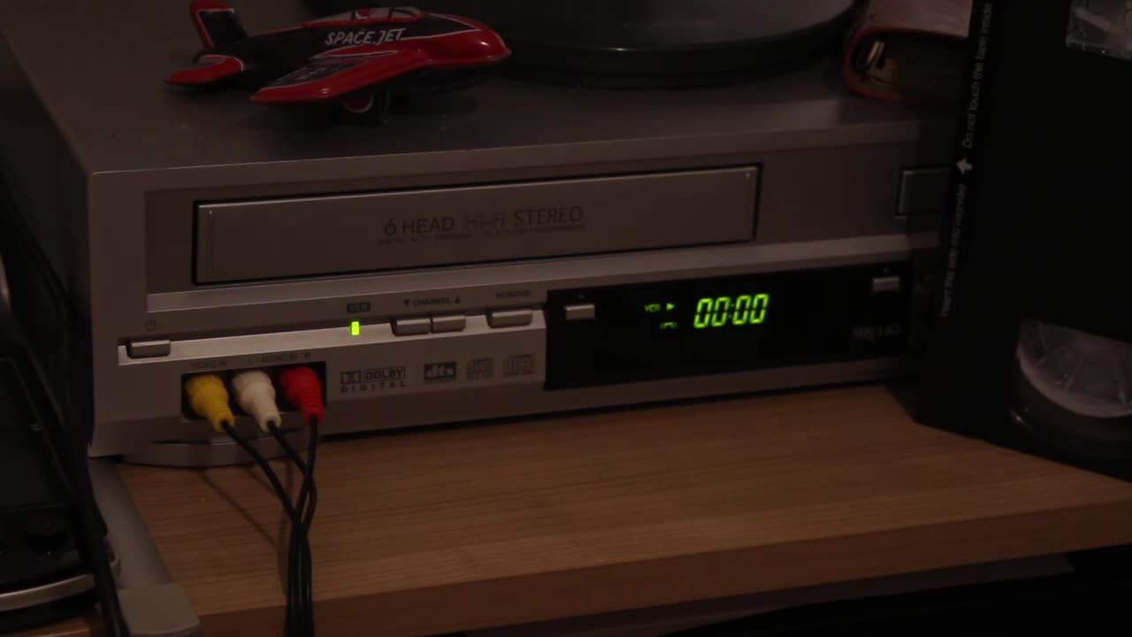 Free Stock Video - Inserting a VHS cassette into a VCR - Best Stock Footage