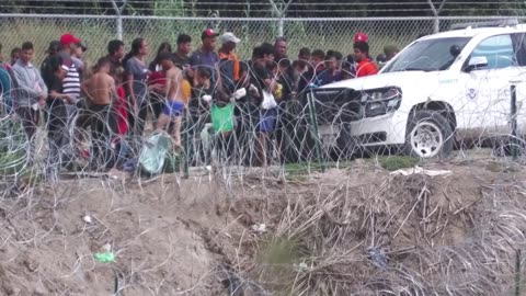 The Federal Government Is Using Forklift To Raise Razor Wire To Let Illegals In From Mexico