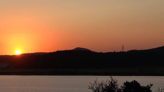 Red sunset, mountains and river trees. 5