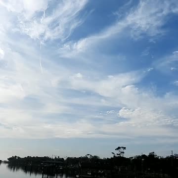 Early Morning Chemtrails Reflecting in the River