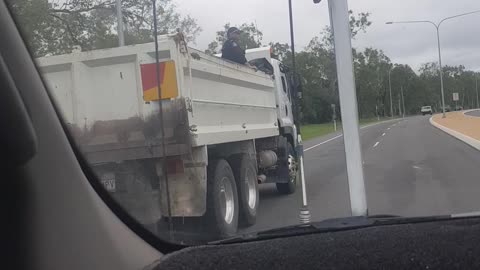 Police Ride Unsecured in Back of Utility Truck