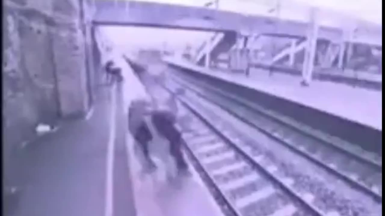 😇 Angel 😇 Stranger Saves Man From Jumping In Front of Speeding Train. Caught On Camera