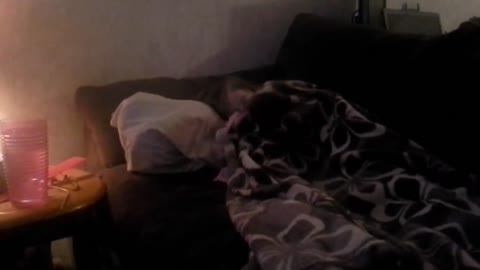 Emma puts doll to sleep