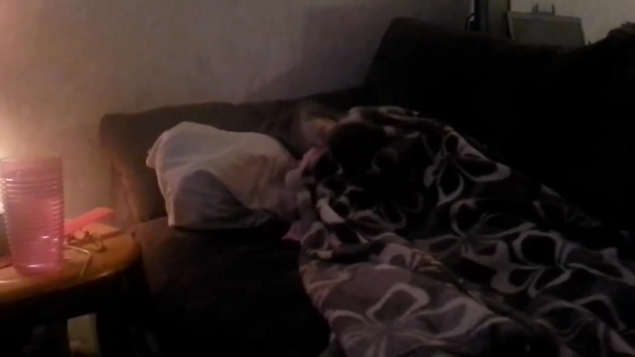 Emma puts doll to sleep