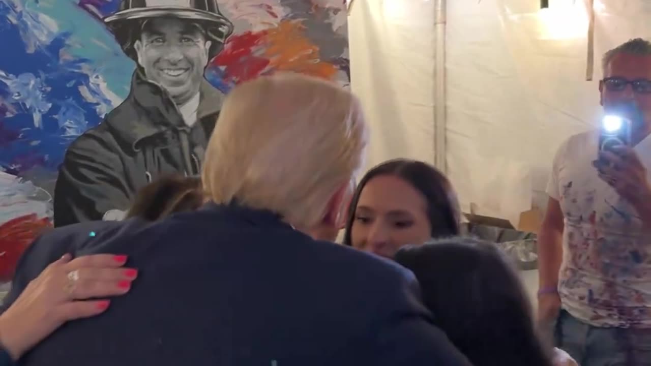 President Donald J. Trump hugs Corey Comperatore's family after the Butler rally.