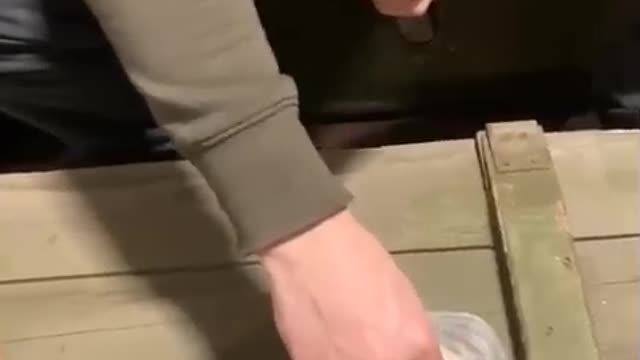 Ukrainian Soldiers on duty lubricate their ammo cartridges with pork lard