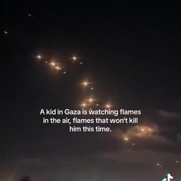 A kid in Gaza is watching flames in the air, flames that won't kill him this time