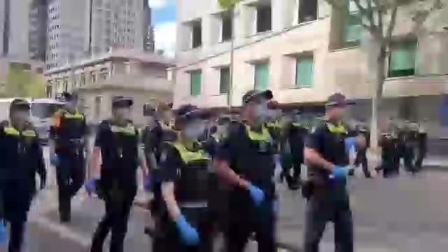 Police march with protesters 2