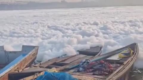 India | Toxic foam floats on the surface of the Yamuna River in Kalindi Kunj, New Delhi ~ Reloaded from World of Signs