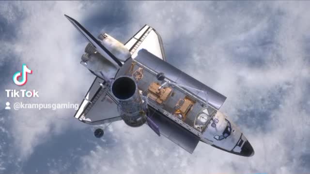 Space Shuttle Deploy Releases HST SM4 Hubble from Arm